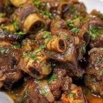 Savory Braised Oxtails with Herb-Infused Sauce