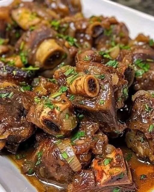 Savory Braised Oxtails with Herb-Infused Sauce