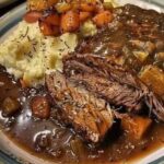 Beef and Gravy Over Mashed Potatoes